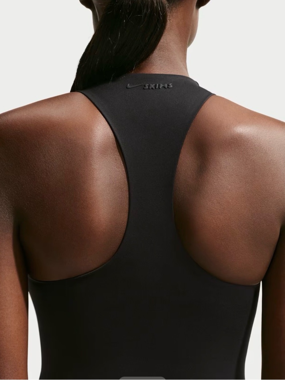 NIKE SKIMS High-Neck Black Seamless Sports Bra - Picture 2 of 6
